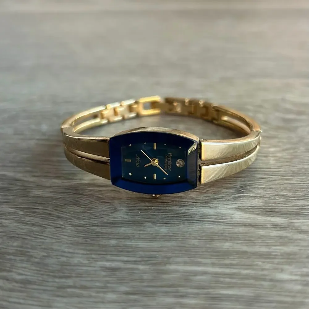 Armitron Diamond Now Blue Dial Gold Tone Bangle Watch